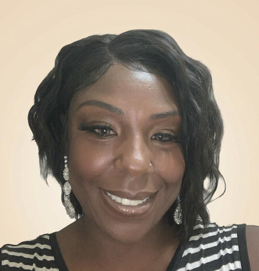 Capri Bougère — owner and lead stylist at Weaves & Wigs by Capri